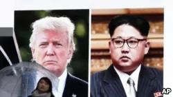 東京街頭顯示川普和金正恩的巨大屏幕(美聯社)